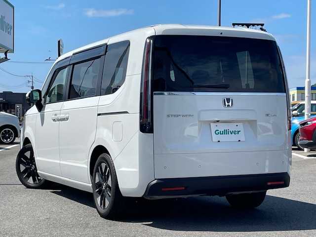 ホンダ ステップワゴン eHEV エアー 長崎県 2022(令4)年 1.5万km プラチナホワイトパール ワンオーナー/純正8インチナビ/CD/DVD/BT/USB/フルセグTV/バックカメラ/両側パワースライドドア/ホンダセンシング/レーダークルーズコントロール/純正ドライブレコーダー/ステアリングスイッチ/純正16インチAW/LEDヘッドライト/ETC