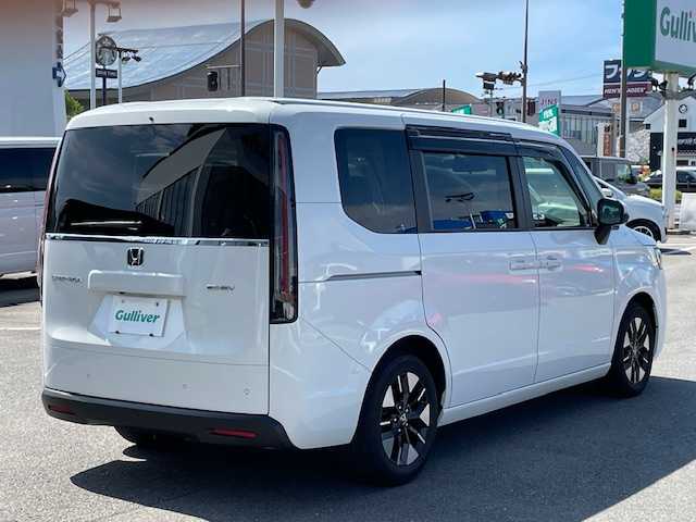ホンダ ステップワゴン eHEV エアー 長崎県 2022(令4)年 1.5万km プラチナホワイトパール ワンオーナー/純正8インチナビ/CD/DVD/BT/USB/フルセグTV/バックカメラ/両側パワースライドドア/ホンダセンシング/レーダークルーズコントロール/純正ドライブレコーダー/ステアリングスイッチ/純正16インチAW/LEDヘッドライト/ETC