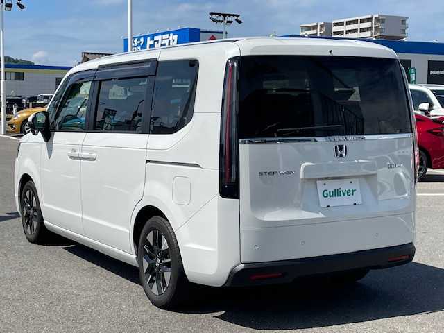 ホンダ ステップワゴン eHEV エアー 長崎県 2022(令4)年 1.5万km プラチナホワイトパール ワンオーナー/純正8インチナビ/CD/DVD/BT/USB/フルセグTV/バックカメラ/両側パワースライドドア/ホンダセンシング/レーダークルーズコントロール/純正ドライブレコーダー/ステアリングスイッチ/純正16インチAW/LEDヘッドライト/ETC