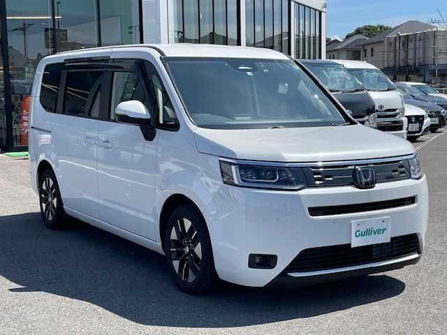 ホンダ ステップワゴン eHEV エアー 長崎県 2022(令4)年 1.5万km プラチナホワイトパール ワンオーナー/純正8インチナビ/CD/DVD/BT/USB/フルセグTV/バックカメラ/両側パワースライドドア/ホンダセンシング/レーダークルーズコントロール/純正ドライブレコーダー/ステアリングスイッチ/純正16インチAW/LEDヘッドライト/ETC