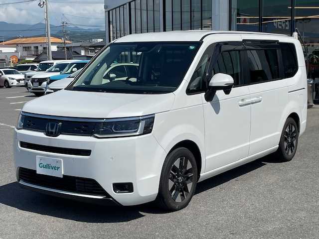 ホンダ ステップワゴン eHEV エアー 長崎県 2022(令4)年 1.5万km プラチナホワイトパール ワンオーナー/純正8インチナビ/CD/DVD/BT/USB/フルセグTV/バックカメラ/両側パワースライドドア/ホンダセンシング/レーダークルーズコントロール/純正ドライブレコーダー/ステアリングスイッチ/純正16インチAW/LEDヘッドライト/ETC