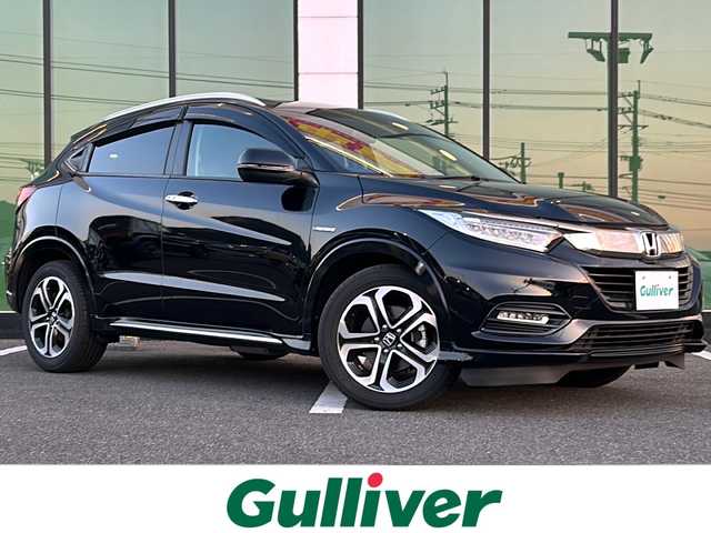 ホンダ ヴェゼル ハイブリッド Z ホンダセンシング 福岡県 2019(令1)年 6.1万km クリスタルブラックパール 純正ナビ/（AM／FM／CD／DVD／BT）/アダクティブクルーズコントロール/ビルトインETC/ドライブレコーダー/シートヒーター/オートライト/LEDヘッドライト/オートブレーキホールド/ステアリングスイッチ/パドルシフト/車線逸脱防止装置/先行車標識認識/USB入力端子/フロントフォグ/ウィンカーミラー/ドアミラーヒーター/純正ドアバイザー/バックカメラ/プッシュスタート