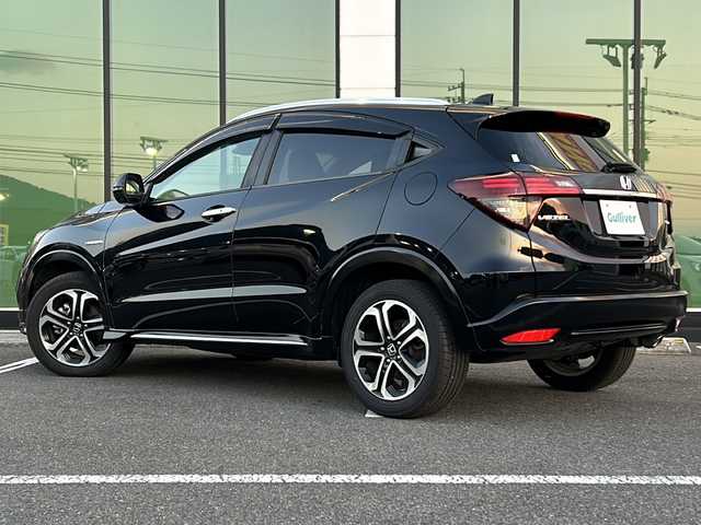 ホンダ ヴェゼル ハイブリッド Z ホンダセンシング 福岡県 2019(令1)年 6.1万km クリスタルブラックパール 純正ナビ/（AM／FM／CD／DVD／BT）/アダクティブクルーズコントロール/ビルトインETC/ドライブレコーダー/シートヒーター/オートライト/LEDヘッドライト/オートブレーキホールド/ステアリングスイッチ/パドルシフト/車線逸脱防止装置/先行車標識認識/USB入力端子/フロントフォグ/ウィンカーミラー/ドアミラーヒーター/純正ドアバイザー/バックカメラ/プッシュスタート