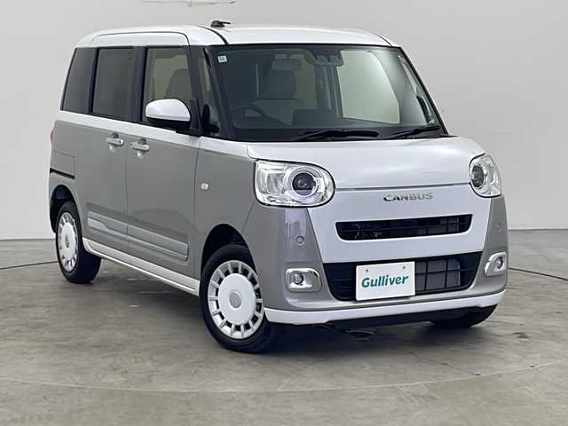 ダイハツ ムーヴ キャンバス ストライプス G ターボ 秋田県 2024(令6)年 0.2万km シャイニングホワイトパール/スムーズグレーマイカメタリック ４ＷＤ/両側パワースライドドア/衝突被害軽減システム/横滑り防止装置/レーンキープアシスト/後ろコーナーセンサー/前席シートヒーター/レーダークルーズコントロール/アイドリングストップ/クリアランスソナー/純正フロアマット/ＬＥＤライト/フォグランプ/オートライト/スペアキー/電動格納ミラー/自動パーキングブレーキ/オートホールド/オートエアコン/USBポート/ステアリングリモコン装着車両/バックカメラ装着車両