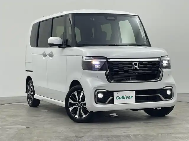 ホンダ Ｎ ＢＯＸ カスタム コーディネートスタイル 群馬県 2025(令7)年 0.1千km プラチナホワイトパール 登録済未使用車/純正ホンダコネクトナビ /バックカメラ/両側パワースライドドア /アダプディブクルーズコントロール/前後コーナーセンサー/前席シートヒーター /ABS/横滑り防止装置/衝突被害軽減システム/スマートキー/プッシュスタート/ハーフレザーシート/SRSエアバッグ（運転席/助手席/サイド/カーテン）/LEDライト/純正14インチアルミホイール