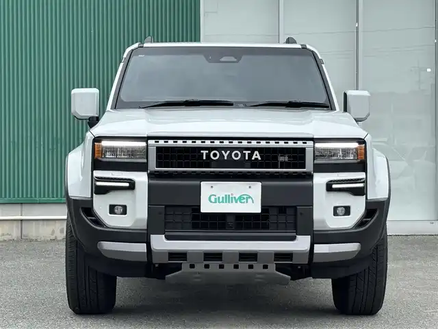 トヨタ ランドクルーザー ２５０ VX 福岡県 2024(令6)年 0.4万km プラチナホワイトパールマイカ プッシュスタートボタン/スマートキー/クルーズコントロール/純正メーカーナビ/Bluetoothオーディオ/USB接続/ETC2.0/全方位カメラ/フルセグTV/HDMI接続/サンルーフ/電動リアゲート/純正フロアマット/運転席パワーシート/レザーシート/純正アルミホイール/LEDヘッドライト/SOSコール
