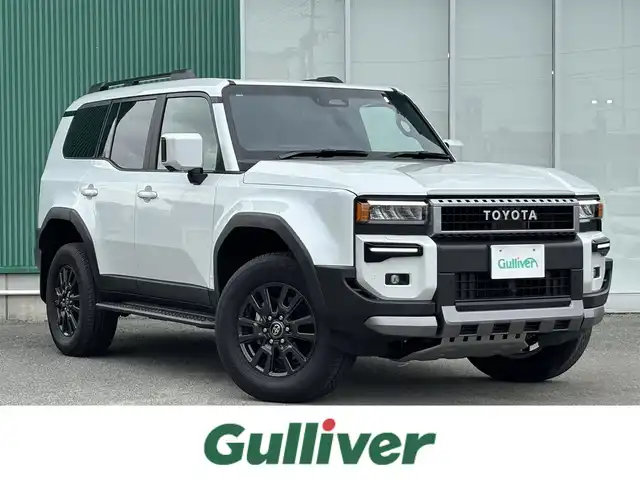 トヨタ ランドクルーザー ２５０ VX 福岡県 2024(令6)年 0.4万km プラチナホワイトパールマイカ プッシュスタートボタン/スマートキー/クルーズコントロール/純正メーカーナビ/Bluetoothオーディオ/USB接続/ETC2.0/全方位カメラ/フルセグTV/HDMI接続/サンルーフ/電動リアゲート/純正フロアマット/運転席パワーシート/レザーシート/純正アルミホイール/LEDヘッドライト/SOSコール