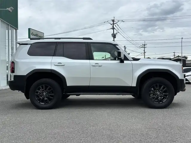 トヨタ ランドクルーザー ２５０ VX 福岡県 2024(令6)年 0.4万km プラチナホワイトパールマイカ プッシュスタートボタン/スマートキー/クルーズコントロール/純正メーカーナビ/Bluetoothオーディオ/USB接続/ETC2.0/全方位カメラ/フルセグTV/HDMI接続/サンルーフ/電動リアゲート/純正フロアマット/運転席パワーシート/レザーシート/純正アルミホイール/LEDヘッドライト/SOSコール
