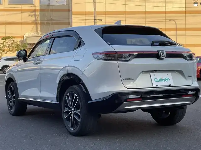 ホンダ ヴェゼル ハイブリッド e:HEV Z 宮城県 2021(令3)年 5.3万km プレミアムサンライトホワイトパール 登録時走行距離52952km/純正ナビ/CD/DVD/Bluetooth/ワンセグTV/シーケンシャルウインカー/純正アルミホイール/置くだけ充電/電動リアゲート/ブラインドスポットモニター/追従クルーズコントロール/パーキングアシスト/シートヒーター/ステアリングヒーター/パドルシフト/LEDフォグランプ/バックカメラ/ETC/ドライブレコーダー