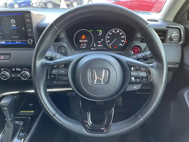 ホンダ ヴェゼル ハイブリッド e:HEV Z 宮城県 2021(令3)年 5.3万km プレミアムサンライトホワイトパール 登録時走行距離52952km/純正ナビ/CD/DVD/Bluetooth/ワンセグTV/シーケンシャルウインカー/純正アルミホイール/置くだけ充電/電動リアゲート/ブラインドスポットモニター/追従クルーズコントロール/パーキングアシスト/シートヒーター/ステアリングヒーター/パドルシフト/LEDフォグランプ/バックカメラ/ETC/ドライブレコーダー