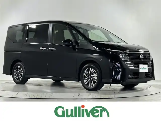 日産 セレナ e－パワー ハイウェイスター V 佐賀県 2024(令6)年 0.9万km ダイヤモンドブラック AA仕入：評価点5点/メーカー純正ナビ/アラウンドビューモニター/インテリジェントルームミラー/ナビ連動ドライブレコーダー/両側パワースライドドア/プロパイロット/ハンズフリースライドドア/純正16インチアルミホイール/安全機能/ヒルスタートアシスト/インテリジェント エマージェンシーブレーキ/LDW（車線逸脱警報）/車両接近通報装置/フロント&バックソナー/インテリジェント LI（車線逸脱防止支援システム）/インテリジェント DA（ふらつき警報）/踏み間違い衝突防止アシスト/標識検知機能/（進入禁止標識検知、最高速度標識検知、/一時停止標識検知）