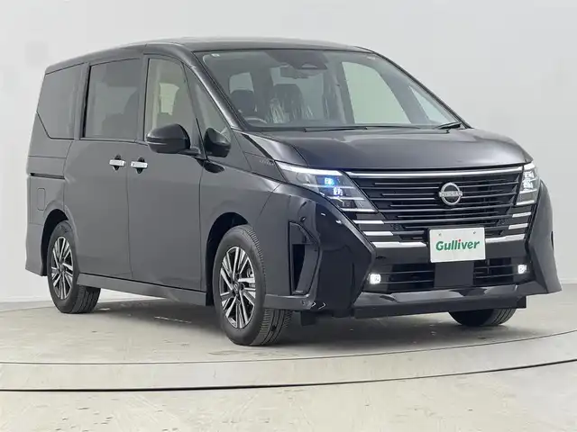 日産 セレナ e－パワー ハイウェイスター V 熊本県 2024(令6)年 0.9万km ダイヤモンドブラック AA仕入：評価点5点/メーカー純正ナビ/アラウンドビューモニター/インテリジェントルームミラー/ナビ連動ドライブレコーダー/両側パワースライドドア/プロパイロット/ハンズフリースライドドア/純正16インチアルミホイール/安全機能/ヒルスタートアシスト/インテリジェント エマージェンシーブレーキ/LDW（車線逸脱警報）/車両接近通報装置/フロント&バックソナー/インテリジェント LI（車線逸脱防止支援システム）/インテリジェント DA（ふらつき警報）/踏み間違い衝突防止アシスト/標識検知機能/（進入禁止標識検知、最高速度標識検知、/一時停止標識検知）