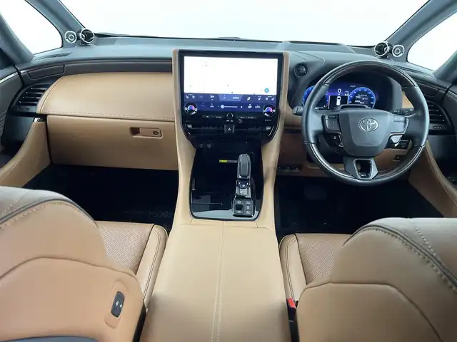 トヨタ ヴェルファイア ハイブリット Z プレミア 埼玉県 2024(令6)年 1.8万km プラチナホワイトパールマイカ ツインルーフ/ユニバーサルステップ/純正ナビゲーション/（フルセグTV/Bluetooth/ミラキャスト/AM/FM/HDMI）/全方位カメラ/クリアランスソナー /純正13.2型有機EL後席ディスプレイ/レーダークルーズコントロール/両側パワースライドドア /ビルトインETC2.0/パドルシフト/プリクラッシュセーフティ/安心降車アシスト/レーンディパーチャーアラート/ブラインドスポットモニター/電動パーキングブレーキ/ブレーキホールド/置くだけ充電/パワーシート/シートヒーター/エアシート/オットマン/３眼LEDヘッドライト/純正１９インチアルミホイール