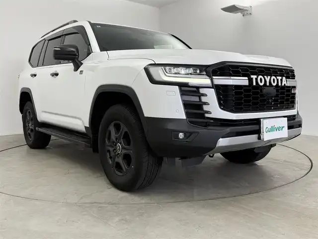 トヨタ ランドクルーザー GRスポーツ 愛知県 2022(令4)年 2.9万km プレシャスホワイトパール ４WD/トヨタセーフティーセンス/レーダークルーズコントロール/JBLプレミアムサウンド/パノラマルーフ/純正ディスプレイナビ/・Bluetooth/・フルセグTV/・Applecarplay/アラウンドビューモニター/パワーバックドア/シートヒーター/エアシート/赤黒革レザーシート/ブラインドスポットモニター/革巻きステアリング/ステアリングリモコン/社外デジタルインナーミラー/前後ドライブレコーダー/HUD/AC100V/純正アルミホイール/純正GRフロアマット/シーケンシャルライト/フォグランプ/ディライト/トノカバー