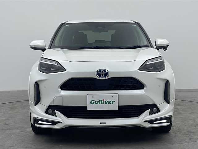 トヨタ ヤリスクロス ハイブリッド Z 三重県 2021(令3)年 6.4万km ホワイトパールクリスタルシャイン 禁煙車/モデリスタフルエアロ/Toyota Safety Sense	/・プリクラッシュセーフティ	/・レーントレーシングアシスト	/・レーダークルーズコントロール	/・ロードサインアシスト	/・発進遅れ告知機能	/・プロアクティブドライビングアシスト	/・オートマチックハイビーム	/ブラインドスポットモニター/ヘッドアップディスプレイ/純正ディスプレイオーディオ（ナビあり）/BT.USB.Miracast/バックカメラ/ビルトインETC2.0/電動パーキングブレーキ/オートホールド/LEDヘッドライト/ハーフレザーシート/シートヒーター/パワーシート/プッシュスタート/スマートキーｘ２