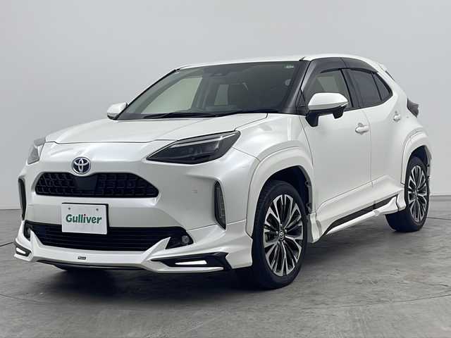 トヨタ ヤリスクロス ハイブリッド Z 三重県 2021(令3)年 6.4万km ホワイトパールクリスタルシャイン 禁煙車/モデリスタフルエアロ/Toyota Safety Sense	/・プリクラッシュセーフティ	/・レーントレーシングアシスト	/・レーダークルーズコントロール	/・ロードサインアシスト	/・発進遅れ告知機能	/・プロアクティブドライビングアシスト	/・オートマチックハイビーム	/ブラインドスポットモニター/ヘッドアップディスプレイ/純正ディスプレイオーディオ（ナビあり）/BT.USB.Miracast/バックカメラ/ビルトインETC2.0/電動パーキングブレーキ/オートホールド/LEDヘッドライト/ハーフレザーシート/シートヒーター/パワーシート/プッシュスタート/スマートキーｘ２