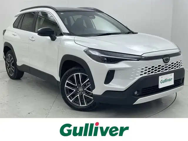 トヨタ カローラ クロス ハイブリッド Z 茨城県 2025(令7)年 0.1千km プラチナホワイトパールマイカ 10.5インチ純正ディスプレイオーディオ　ナビ＋TVキッド/Apple CarPlay/Android Auto/Miracast//Bluetooth/フルセグ/radio/Toyota Safety Sense/・プリクラッシュセーフティ/・レーントレーシングアシスト/・レーンディパーチャーアラート/・レーダークルーズコントロール（全車速追従機能付）/・オートマチックハイビーム/・ロードサインアシスト/・ドライバー異常時対応システム/・プロアクティブドライビングアシスト/・発進遅れ告知機能/バックモニター/パノラマルーフ(OP)/前方ドラレコ＋バックガイドモニター（簡易録画機能付）　/BSM(OP)/運転席パワーシート/前席シートヒーター/ベンチレーション/パワーバックドア/ETC2.0/LEDヘッドライト