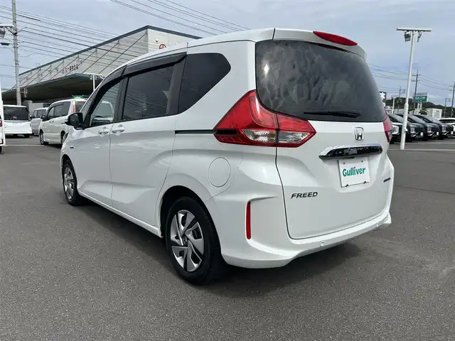 ホンダ フリード ハイブリット G ホンダセンシング 岡山県 2020(令2)年 4万km プラチナホワイトパール 登録時走行距離39814km/KENWOOD8インチナビ/（AM.FM.BT.TV.CD.DVD）/ALPINEフリップダウンモニター/バックカメラ/両側パワースライドドア/ホンダセンシング/・オートマチックハイビーム/・レーンディパーチャアラート/・レーダークルーズコントロール/・衝突軽減ブレーキ/ビルトインETC/シートヒーター
