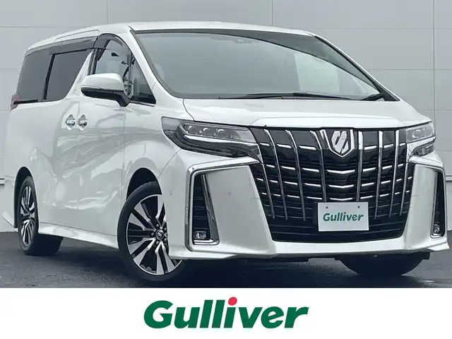 トヨタ アルファード S Cパッケージ 佐賀県 2020(令2)年 6.8万km ホワイトパールクリスタルシャイン JBLプレミアムサウンド/デジタルインナーミラー/トヨタセーフティセンス/・プリクラッシュセーフティ/・レーントレーシングアシスト/・レーダークルーズコントロール/・オートマチックハイビーム/ブラインドスポットモニター/インテリジェントクリアランスソナー/インテリジェントパーキングアシスト/パーキングサポートブレーキ/ブラインドスポットモニター/純正ディスプレイオーディオナビ/・パノラミックビューモニター/・フルセグTV/BT/CD/DVD/純正フリップダウンモニター/純正18インチAW/3眼LEDヘッドライト/フォグランプ/パワーバックドア/両側パワースライドドア/合皮シート/・パワーシート/・シートヒーター/・シートベンチレーション/メタルウッド革巻きステアリング/ステアリングヒーター/前後ドラレコ(ZDR-015)/電動パーキングスイッチ/ETC/スペアキー×１/純正エンジンスターター