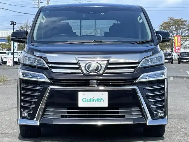 トヨタ ヴェルファイア Z 道央・札幌 2018(平30)年 5.2万km バーニングブラッククリスタルシャインガラスフレーク ４WD/純正ディーラーOPナビ/AM/FM/BT/SD/DVD/フルセグ/トヨタセーフティセンス/衝突被害軽減ブレーキ/レーダークルーズコントロール/レーンキープアシスト/クリアランスソナー/バックカメラ/ビルトインETC/ドライブレコーダー/アイドリングストップ/ECOMODE/両側パワースライドドア/革巻きステアリング/ステアリングリモコン/電動パーキング/ブレーキホールド/MTモード付AT/プッシュスタート/スマートキー/LEDヘッドライト/オートライト/オートマチックハイビーム/フォグランプ/電動格納ミラー/ウィンカーミラー/純正フロアマット/ドアバイザー