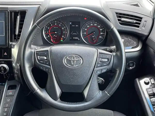 トヨタ ヴェルファイア Z 道央・札幌 2018(平30)年 5.2万km バーニングブラッククリスタルシャインガラスフレーク ４WD/純正ディーラーOPナビ/AM/FM/BT/SD/DVD/フルセグ/トヨタセーフティセンス/衝突被害軽減ブレーキ/レーダークルーズコントロール/レーンキープアシスト/クリアランスソナー/バックカメラ/ビルトインETC/ドライブレコーダー/アイドリングストップ/ECOMODE/両側パワースライドドア/革巻きステアリング/ステアリングリモコン/電動パーキング/ブレーキホールド/MTモード付AT/プッシュスタート/スマートキー/LEDヘッドライト/オートライト/オートマチックハイビーム/フォグランプ/電動格納ミラー/ウィンカーミラー/純正フロアマット/ドアバイザー