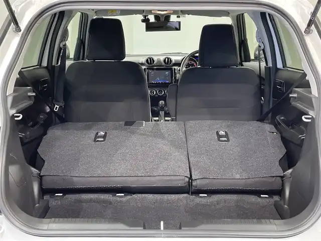スズキ スイフト HYBRID RS 愛知県 2019(平31)年 1.3万km ピュアホワイトP 純正８インチＳＤナビ/（Bluetooth/フルセグTV/SD/CD・DVD再生）　/衝突軽減ブレーキ　/シートヒーター　/ビルトインＥＴＣ　/ドライブレコーダー　/ＬＥＤヘッドライト　/レーンアシスト/パドルシフト　/フォグランプ　/純正フロアマット/純正１６インチアルミ