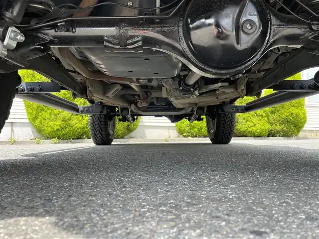 スズキ ジムニー XC 岩手県 2018(平30)年 6.9万km ピュアホワイトP 純正ディスプレイオーディオ/シートカバー/グリルガード/リフトアップ/オーバーフェンダー /ルーフラック/ギーアイギアサイドステップ/トーヨーオープンカントリー/ギーアイギアリアラダー/クルーズコントロール/ステアリングリモコン/LEDヘッドライト