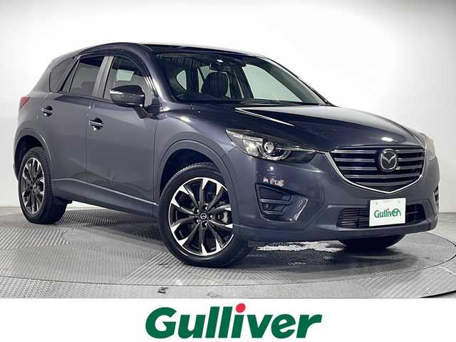 マツダ ＣＸ－５ XD Lパッケージ 広島県 2016(平28)年 4.2万km メテオグレーマイカ 純正ナビ/黒革シート/パワーシート/ポジションメモリー/シートヒーター/バックカメラ/レーダークルーズコントロール/衝突軽減ブレーキ/車線逸脱警報/ハイビームアシスト/誤発進抑制機能/ブラインドスポットモニター/パーキングセンサー/電動パーキングブレーキ/LEDヘッドランプ/純正19インチAW/ETC