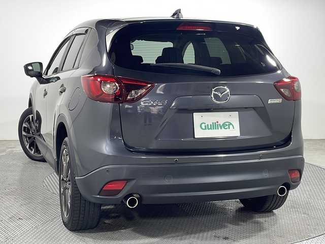 マツダ ＣＸ－５ XD Lパッケージ 広島県 2016(平28)年 4.2万km メテオグレーマイカ 純正ナビ/黒革シート/パワーシート/ポジションメモリー/シートヒーター/バックカメラ/レーダークルーズコントロール/衝突軽減ブレーキ/車線逸脱警報/ハイビームアシスト/誤発進抑制機能/ブラインドスポットモニター/パーキングセンサー/電動パーキングブレーキ/LEDヘッドランプ/純正19インチAW/ETC