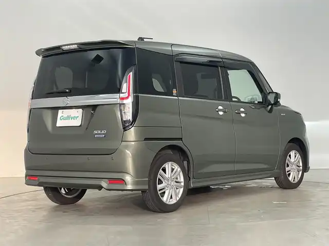 スズキ ソリオ HV MZ 埼玉県 2023(令5)年 0.9万km タフカーキパールメタリック 純正９インチナビ　全周囲カメラ　　両側パワースライドドア　ＨＵＤ　レーダークルーズコントロール　ＬＥＤヘッドライト　プッシュスタート　スマートキー　地デジフルセグ　前後ドライブレコーダー