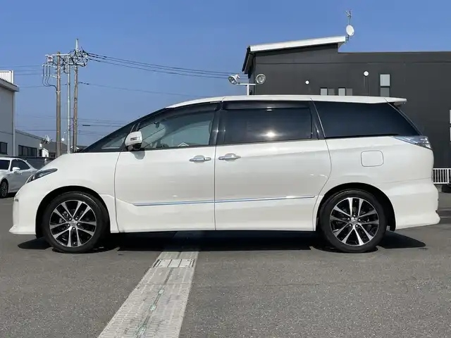 トヨタ エスティマ アエラス レザーパッケージ 兵庫県 2014(平26)年 7.9万km ホワイトパールクリスタルシャイン 純正８インチナビ(フルセグTV・CD・DVD・BLUETOOTH)/フリップダウンモニター/Bカメラ/オットマン/運転席パワーシート/ハーフレザーシート/ビルトインETC/ウォークスルー/ドラレコ