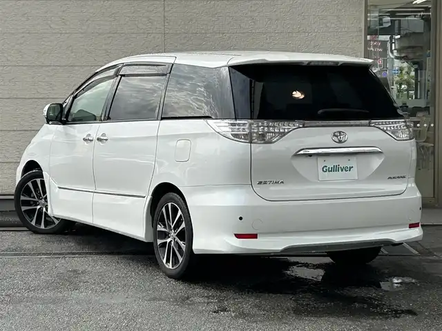 トヨタ エスティマ アエラス レザーパッケージ 兵庫県 2014(平26)年 7.9万km ホワイトパールクリスタルシャイン 純正8インチナビ/純正フリップダウンモニター/(CD/DVD/BT/SD)/フルセグTV/バックカメラ/ETC/両側パワースライドドア/前方ドライブレコーダー/クルーズコントロール/前後コーナーセンサー/HIDヘッドライト/オートライト/フォグランプ/ハーフレザーシート/パワーシート/ステアリングリモコン/スマートキー/スペアキー/電動格納ミラー/純正ドアバイザー/純正フロアマット/純正アルミ18インチ