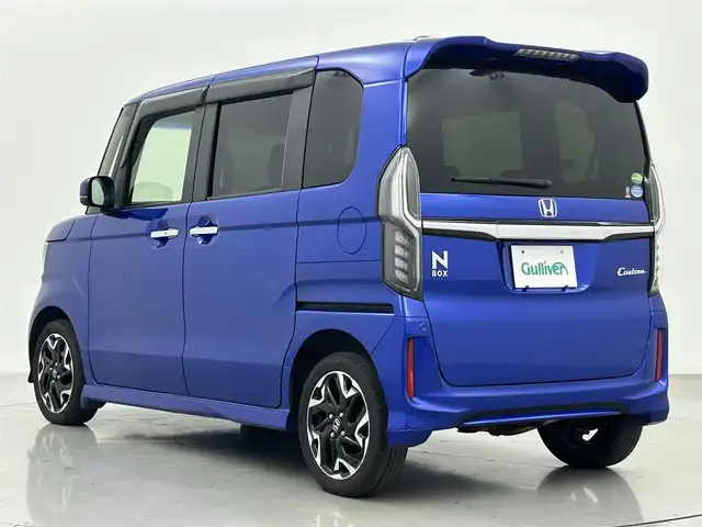 ホンダ Ｎ ＢＯＸ カスタム G L ターボ ホンダセンシング 熊本県 2018(平30)年 7万km ブリリアントスポーティブルーメタリック2トーン 社外ナビCN-RE03D（ＣＤ・ＤＶＤ・フルセグ・ＢＴ）/バックカメラ　/前席シートヒーター　/両側パワースライドドア/ホンダセンシング/・衝突軽減ブレーキ/・標識認識システム/・路外逸脱制御機能/・レーンキープアシスト/・先行車発進お知らせ/・オートマチックハイビーム/・レーダークルーズコントロール/横滑り防止/ハーフレザーシート/パドルシフト/純正フロアマット/純正１５インチAW/オートライト/LEDヘッドライト/フォグライト/スマートキー/プッシュスタート