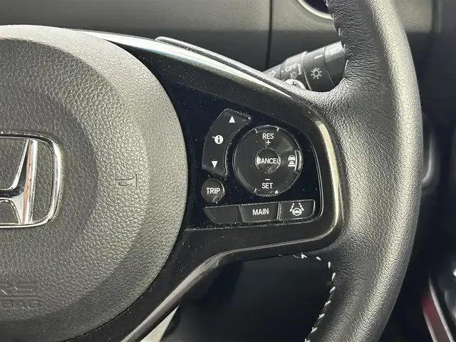 ホンダ Ｎ ＢＯＸ カスタム G L ターボ ホンダセンシング 熊本県 2018(平30)年 7万km ブリリアントスポーティブルーメタリック2トーン 社外ナビCN-RE03D（ＣＤ・ＤＶＤ・フルセグ・ＢＴ）/バックカメラ　/前席シートヒーター　/両側パワースライドドア/ホンダセンシング/・衝突軽減ブレーキ/・標識認識システム/・路外逸脱制御機能/・レーンキープアシスト/・先行車発進お知らせ/・オートマチックハイビーム/・レーダークルーズコントロール/横滑り防止/ハーフレザーシート/パドルシフト/純正フロアマット/純正１５インチAW/オートライト/LEDヘッドライト/フォグライト/スマートキー/プッシュスタート