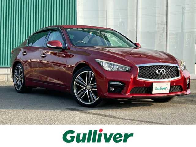 日産 スカイライン 200GT－t タイプSP 福岡県 2016(平28)年 6.5万km ラディアントレッド ワンオーナー/純正8型ナビ(BT/CD/DVD)/フルセグTV/バック/サイド/フロントカメラ/ビルトインETC/インテリジェントクルーズコントロール/ソナー機能/全方位運転支援システム/・車線逸脱防止支援システム/・後側方衝突防止支援システム/・後退時衝突防止支援システム/・前方衝突予測警報/・インテリジェントペダル/ターボ/LEDヘッドランプ(AFS)/本革巻きステアリング/パドルシフト/ブラック革シート/前席パワーシート/シートヒーター/運転席パーソナルドライビングポジションメモリー/純正19インチアルミホイール/インテリジェントキー/プッシュエンジンスターター