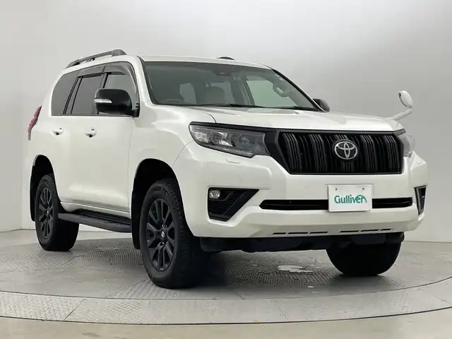 トヨタ ランドクルーザー プラド TX Lパッケージ マットブラED 新潟県 2022(令4)年 3万km ホワイトパールクリスタルシャイン ４ＷＤ/禁煙車　/ワンオーナー　/サンルーフ　/ベージュ革シート　/パナソニックフローティングナビ(CD/DVD/BT/フルセグTV)/Ｂｌｕｅｔｏｏｔｈ接続　/バックモニター　/ＥＴＣ　/ブラックルーフレール　/運転席/助手席パワーシート　/運転席/助手席シートヒーター　/運転席/助手席エアシート/トヨタセーフティセンス/・クリアランスソナー/・プリクラッシュセーフティ/・先行車発進通知/・オートマチックハイビーム/レーダークルーズコントロール/LEDヘッドライト/スペアキー