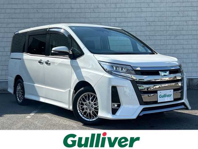 トヨタ ノア ハイブリッド Si ダブルバイビーⅢ 大阪府 2021(令3)年 4.6万km ホワイトパールクリスタルシャイン １０インチナビ　/フルセグ　/Ｂｌｕｅｔｏｏｔｈ　/バックカメラ　/フリップダウンモニター　/両側パワースライドドア　/クルーズコントロール　/シートヒーター　/前後ドラレコ　/ＥＴＣ　/前後コーナーセンサー