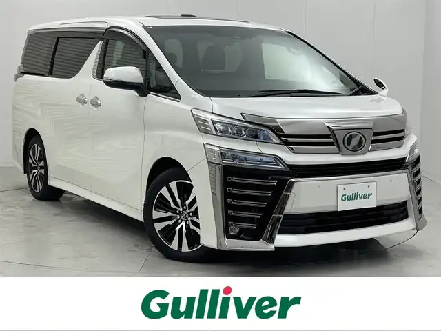 トヨタ ヴェルファイア Z Gエディション 茨城県 2019(平31)年 4.8万km ホワイトパールクリスタルシャイン TOYOTA純正10インチナビ/フルセグ/BTオーディオ/SD/CD/DVD/ビルトインETC/バックカメラ/サンルーフ/前席パワーシート/シートヒーター/エアシート/オットマン/TOYOTA純正後席12.1インチフリップダウンモニター/両側パワースライドドア/社外フロアマット/純正18インチAW/クリアランスソナー/コーナーセンサー/ヒートステアリング/デジタルインナーミラー