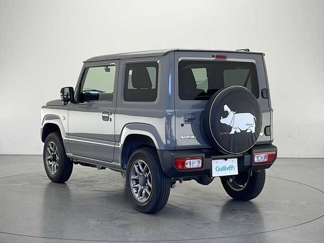 スズキ ジムニー XC 長野県 2021(令3)年 1.5万km ミディアムグレー 4WD/ワンオーナー/社外SDナビ（MDV-S708L）/スズキセーフティサポート/・デュアルセンサーブレーキサポート/・先行車発進お知らせ機能/・標識認識機能/・誤発進抑制機能/・後方誤発進抑制機能/W+サイドエアバッグ/社外前後ドライブレコーダー/プッシュスタート/スマートキー/クルーズコントロール/フルセグTV/D+N席シートヒーター/ビルトインETC/純正フロアマット/純正16インチアルミホイール/保証書/取扱説明書