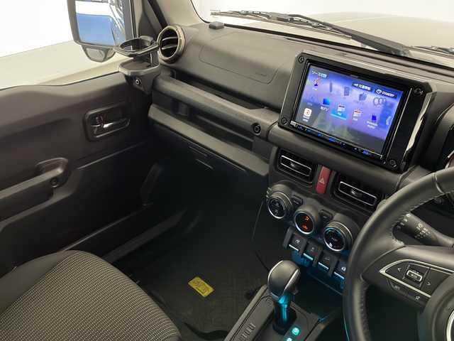 スズキ ジムニー XC 長野県 2021(令3)年 1.5万km ミディアムグレー 4WD/ワンオーナー/社外SDナビ（MDV-S708L）/スズキセーフティサポート/・デュアルセンサーブレーキサポート/・先行車発進お知らせ機能/・標識認識機能/・誤発進抑制機能/・後方誤発進抑制機能/W+サイドエアバッグ/社外前後ドライブレコーダー/プッシュスタート/スマートキー/クルーズコントロール/フルセグTV/D+N席シートヒーター/ビルトインETC/純正フロアマット/純正16インチアルミホイール/保証書/取扱説明書