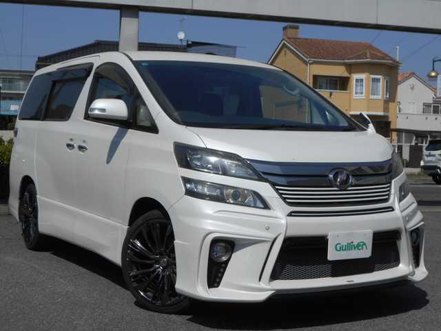 トヨタ ヴェルファイア 2．4Z ゴールデンアイズ 愛知県 2013(平25)年 9.4万km ホワイトパールクリスタルシャイン アルパイン９インチナビ/Bluetooth/DVD/フルセグテレビ/フリップダウンモニター/バックカメラ/ETC/両側パワースライドドア/パワーバックドア/HIDヘッドライト/スマートキー２個/プッシュスタート/シルクブレイズエアロバンパー/RAYS20インチアルミ/純正アルミ・スタッドレスタイヤ4本積込/保証書・取説・ナビ取説あり