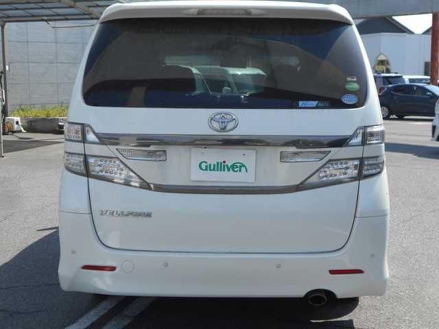 トヨタ ヴェルファイア 2．4Z ゴールデンアイズ 愛知県 2013(平25)年 9.4万km ホワイトパールクリスタルシャイン アルパイン９インチナビ/Bluetooth/DVD/フルセグテレビ/フリップダウンモニター/バックカメラ/ETC/両側パワースライドドア/パワーバックドア/HIDヘッドライト/スマートキー２個/プッシュスタート/シルクブレイズエアロバンパー/RAYS20インチアルミ/純正アルミ・スタッドレスタイヤ4本積込/保証書・取説・ナビ取説あり