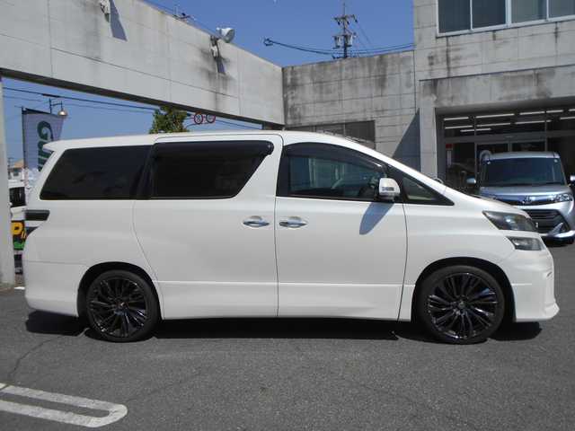 トヨタ ヴェルファイア 2．4Z ゴールデンアイズ 愛知県 2013(平25)年 9.4万km ホワイトパールクリスタルシャイン アルパイン９インチナビ/Bluetooth/DVD/フルセグテレビ/フリップダウンモニター/バックカメラ/ETC/両側パワースライドドア/パワーバックドア/HIDヘッドライト/スマートキー２個/プッシュスタート/シルクブレイズエアロバンパー/RAYS20インチアルミ/純正アルミ・スタッドレスタイヤ4本積込/保証書・取説・ナビ取説あり