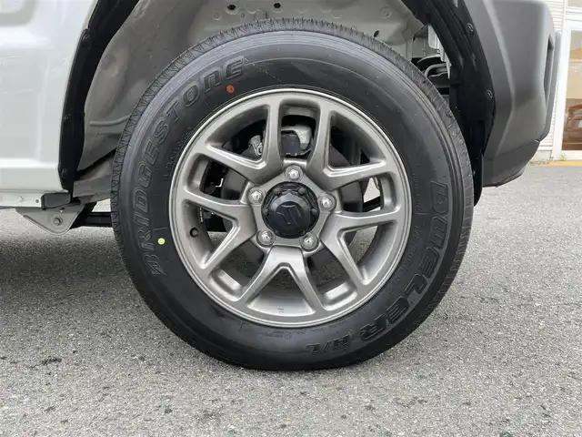スズキ ジムニー XC 岩手県 2024(令6)年 0.1万km未満 ピュアホワイトP 4WD/デュアルセンサーブレーキサポート/レーダークルーズコントロール/前席シートヒーター/純正LEDヘッドライト/純正フォグランプ/ヘッドライトウォッシャー/ステアリングリモコン/スマートキー/保証書/取扱説明書