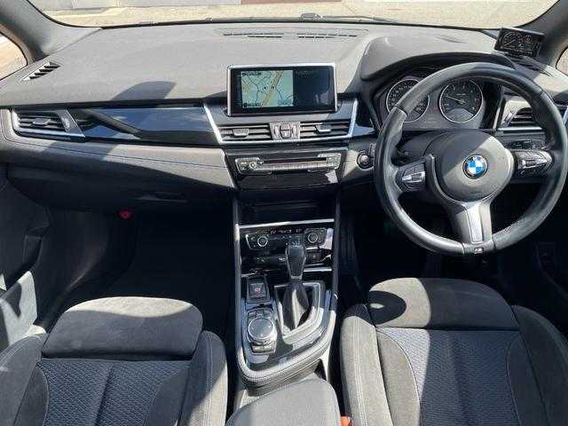 ＢＭＷ ２１８ｄ グランツアラー Mスポーツ 福岡県 2015(平27)年 5.5万km サファイアブラックP ・純正HDDナビ/（CD/DVD/USB/BT/AUX）/・ETC/・ドラレコ前/・バックカメラ/・スマートキー×２/・レーンキープアシスト/・パークアシスト/・革巻きステアリング/・コーナーセンサー前後/・LEDヘッドライト/・オートライト/・フォグライト前後/・電動リヤゲート/・純正17インチAW