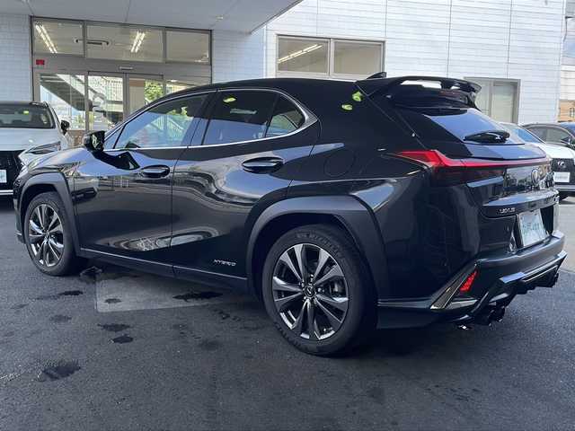 レクサス ＵＸ 250h Fスポーツ 京都府 2019(平31)年 8.9万km グラファイトブラックガラスフレーク 10.3インチ純正SDナビ /フルセグTV/Bluetooth/CD/DVD再生機能/AUX/Miracast/赤本革 /メモリーパワーシート /シートヒーター/エアシート/ステアリングヒーター/サンルーフ /TDRマフラー/アラウンドビューモニター /パドルシフト/BSM /クルコン追従有/レーンキープアシスト/前後コーナーセンサー /3眼LEDヘッドライト  /フロントフォグランプ/オートライト/オートマチックハイビーム/ハンズフリーパワーバックドア/Wサイドエアバッグ/カーテンエアバッグ