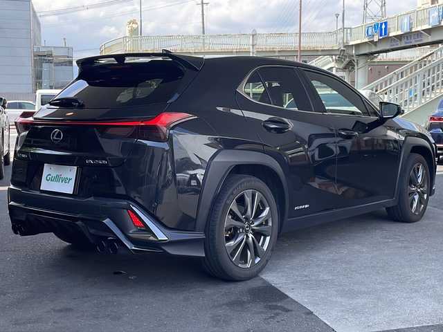 レクサス ＵＸ 250h Fスポーツ 京都府 2019(平31)年 8.9万km グラファイトブラックガラスフレーク 10.3インチ純正SDナビ /フルセグTV/Bluetooth/CD/DVD再生機能/AUX/Miracast/赤本革 /メモリーパワーシート /シートヒーター/エアシート/ステアリングヒーター/サンルーフ /TDRマフラー/アラウンドビューモニター /パドルシフト/BSM /クルコン追従有/レーンキープアシスト/前後コーナーセンサー /3眼LEDヘッドライト  /フロントフォグランプ/オートライト/オートマチックハイビーム/ハンズフリーパワーバックドア/Wサイドエアバッグ/カーテンエアバッグ