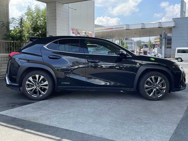 レクサス ＵＸ 250h Fスポーツ 京都府 2019(平31)年 8.9万km グラファイトブラックガラスフレーク 10.3インチ純正SDナビ /フルセグTV/Bluetooth/CD/DVD再生機能/AUX/Miracast/赤本革 /メモリーパワーシート /シートヒーター/エアシート/ステアリングヒーター/サンルーフ /TDRマフラー/アラウンドビューモニター /パドルシフト/BSM /クルコン追従有/レーンキープアシスト/前後コーナーセンサー /3眼LEDヘッドライト  /フロントフォグランプ/オートライト/オートマチックハイビーム/ハンズフリーパワーバックドア/Wサイドエアバッグ/カーテンエアバッグ