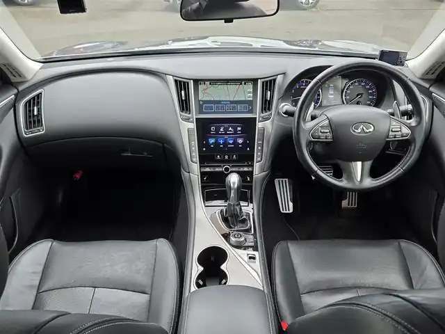 日産 スカイライン 200GT－t タイプSP 鹿児島県 2014(平26)年 8.3万km ダークメタルグレー プロパイロット　/ビルトインＥＴＣ　/純正ＳＤナビ　/Ｂｌｕｅｔｏｏｔｈオーディオ　/フルセグテレビ　/社外レーダー　/Ｄ＋Ｎ席シートヒーター　/Ｄ＋Ｎ席パワーシート　/パドルシフト　/ＭＴモード付きＡＴ　/ドライブレコーダー/レザーシート/前後コーナーセンサー/エアバック(W+サイド)