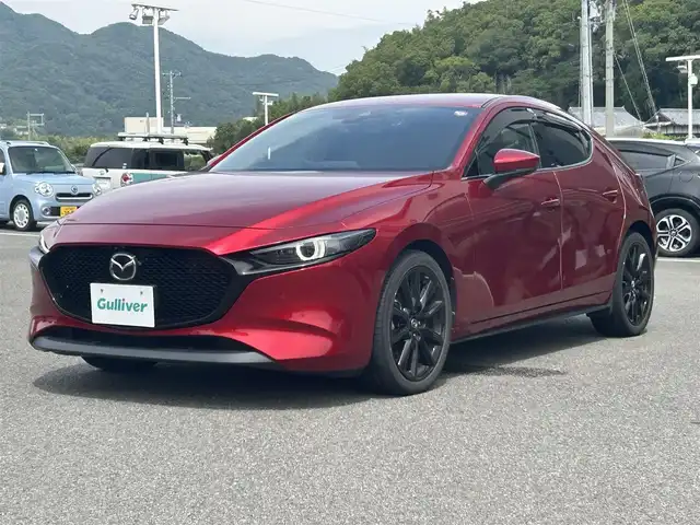 マツダ マツダ３ファストバック X Lパッケージ 兵庫県 2020(令2)年 8.1万km ソウルレッドクリスタルM 純正８．８ナビ/・TV.BT.AM.FM/BOSEスピーカー/衝突軽減装置/レーダークルーズコントロール/BSM/全方位カメラ/HUD/クリアランスソナー/電動パーキングブレーキ/オートホールド/ハンドルヒーター/オートマチックハイビーム/D+N席シートヒーター/D席パワーシート(メモリー付き)/パドルシフト/前後ドラレコ/ビルトインETC/純正フロアマット